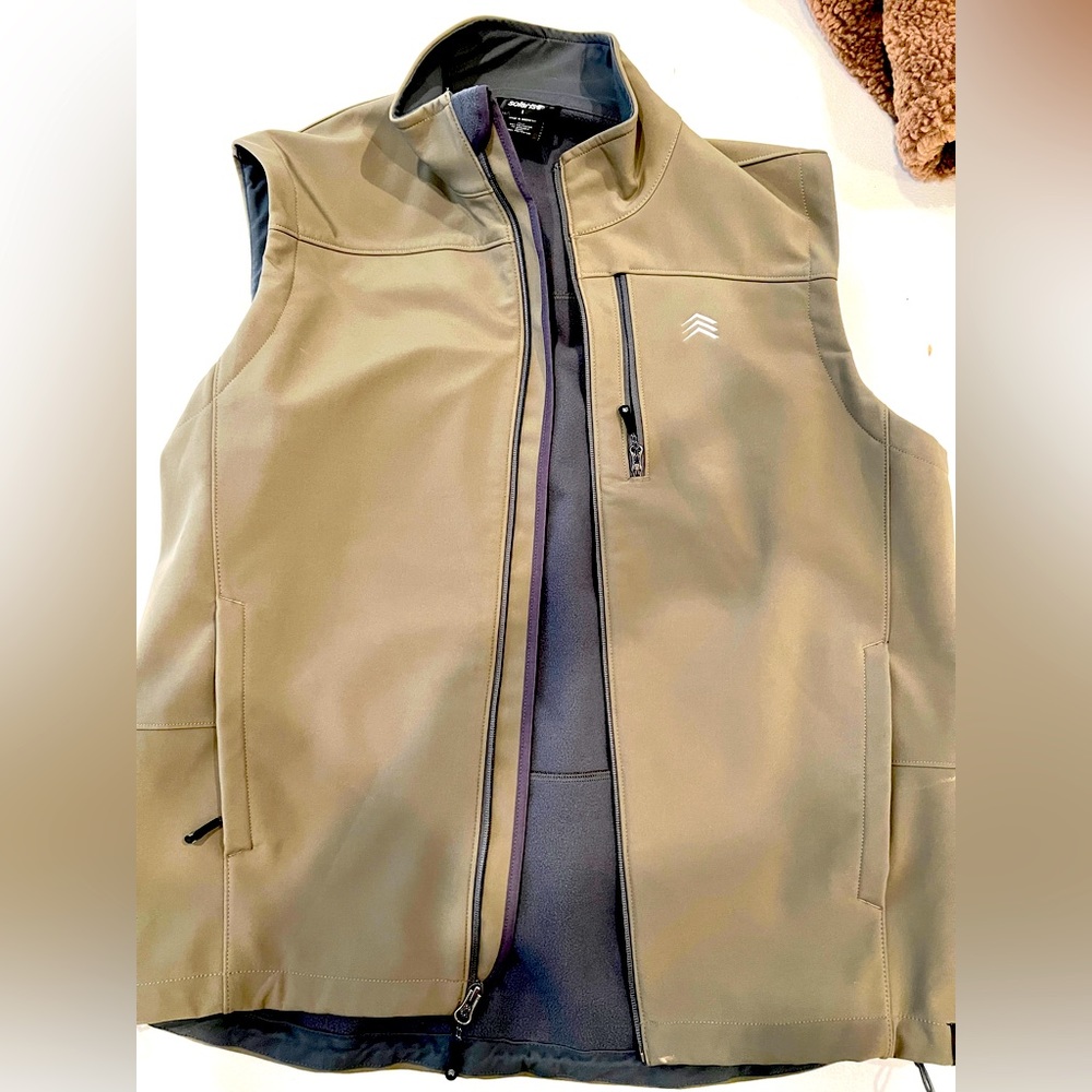 Never worn outdoor vest for serious rain proof hiking